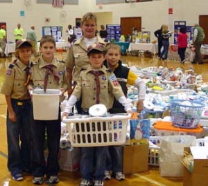 Local Scout troops displaying donations to Holiday Coalition